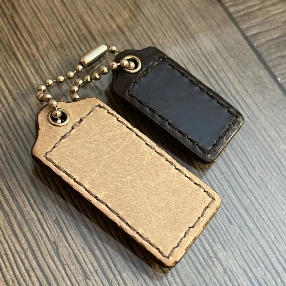 Coach Black and Grayish Tan Leather Keychain Set